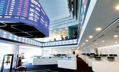 Back to the floor. The usual frenetic pace on the PSE trading floor is replaced with a subdued atmosphere as traders practise physical distancing. The PSE resumed onsite trading on June 1 after more than two months of offsite activities.