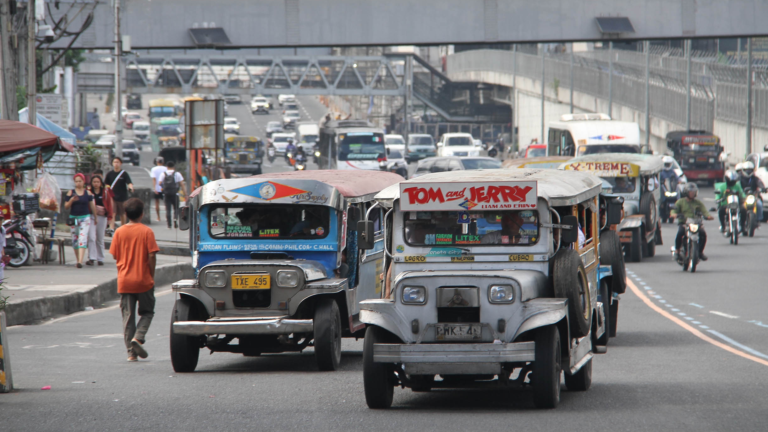 Traditional jeepneys were seen traversing to pick up their passengers along Commonwealth Avenue in Quezon City as the various transport groups made a petition to increase the minimum fare in jeepneys to P15. While The Land Transportation Franchising and Regulatory Board (LTFRB) on Tuesday, January 21, 2025 said it is reviewing the petition to increase the mininum fare in jeepneys. (ROLLY PHOTO)