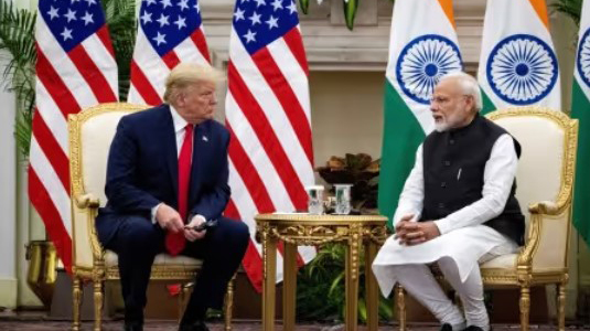 Indian Prime Minister Narendra Modi speaks to US President Donald Trump during a meeting at Hyderabad House in New Delhi, India. (Reuters Photo)