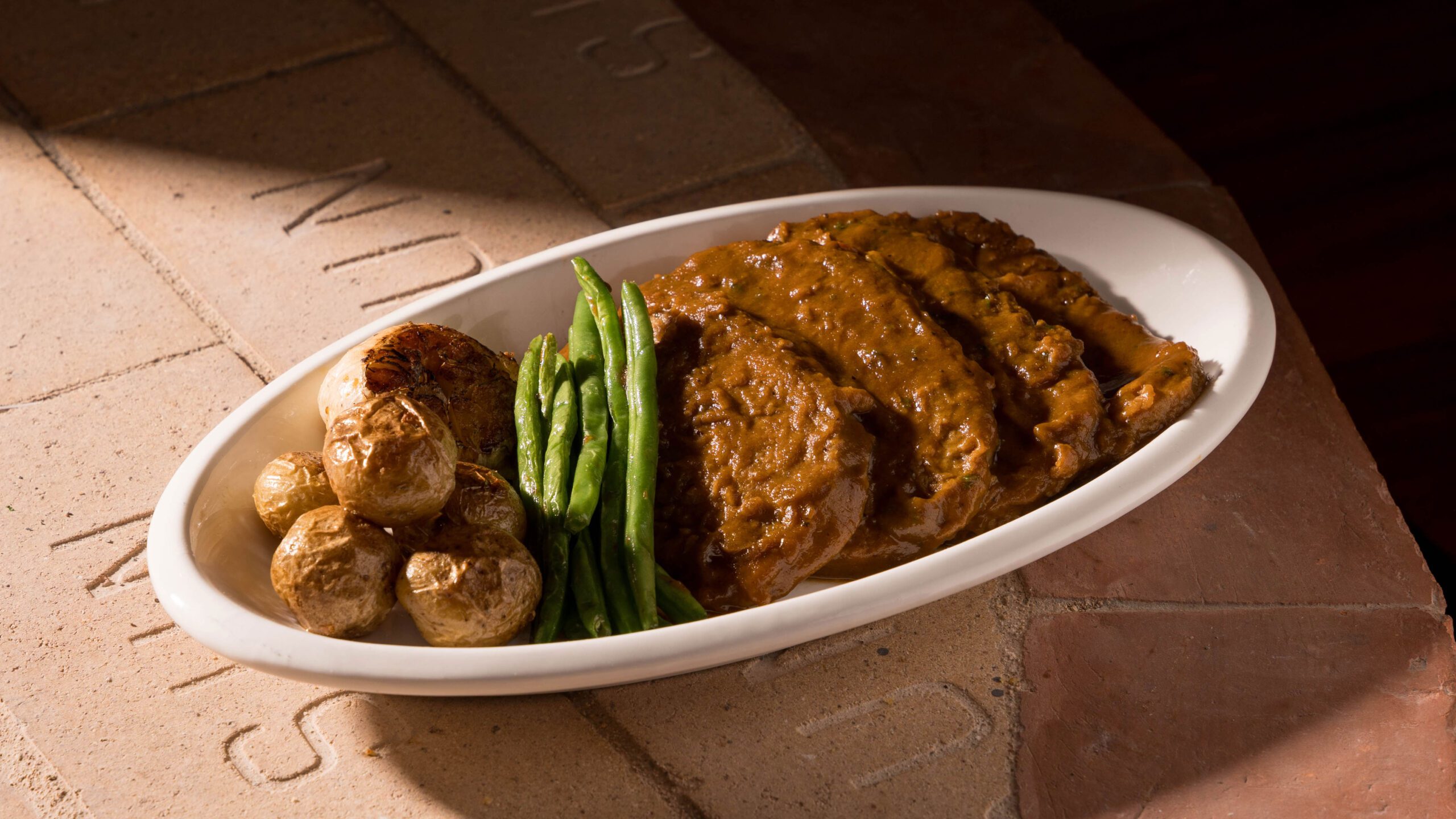 Asador de Manila - Lengua Estofada