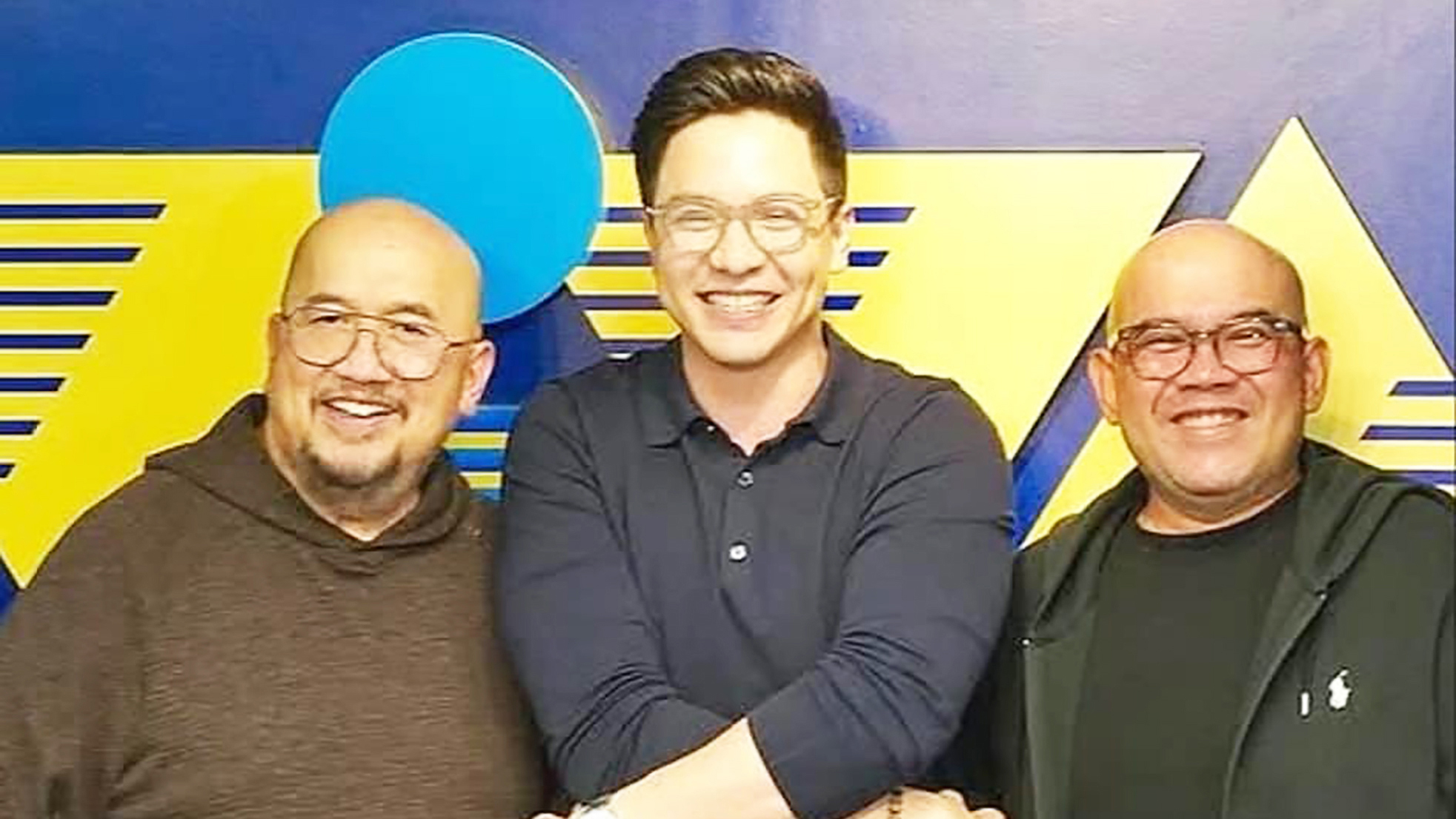 VINCENT DEL ROSARIO III and VIC DEL ROSARIO flank actor ALDEN RICHARDS
